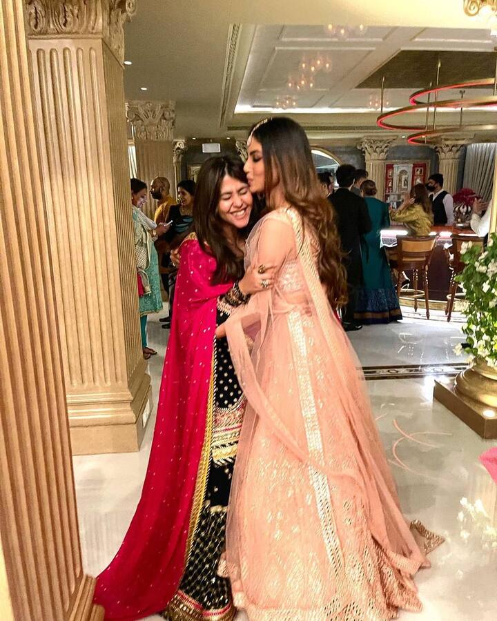 Mouni Roy can be seen showering Ekta Kapoor with cousins in the photo. Mouni's biggest hit of her TV career, Naagin,, was produced by Balaji Telefilms.