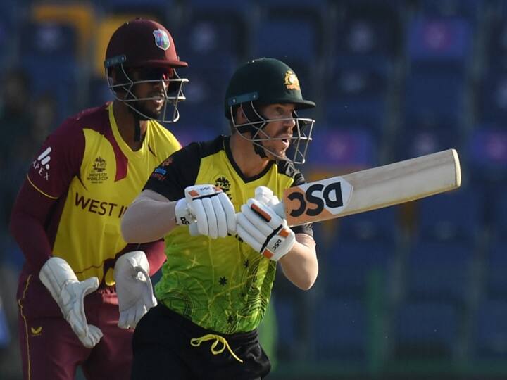 AUS vs WI Australia beat West Indies by 8 wickets David Warner scored 89 runs T20 WC 2021 semi-final battle become Thrilling AUS vs WI: ऑस्ट्रेलिया ने बढ़ाई दक्षिण अफ्रीका की मुश्किलें, वेस्टइंडीज को 22 गेंद पहले हराकर सेमीफाइनल के लिए पेश की दावेदारी