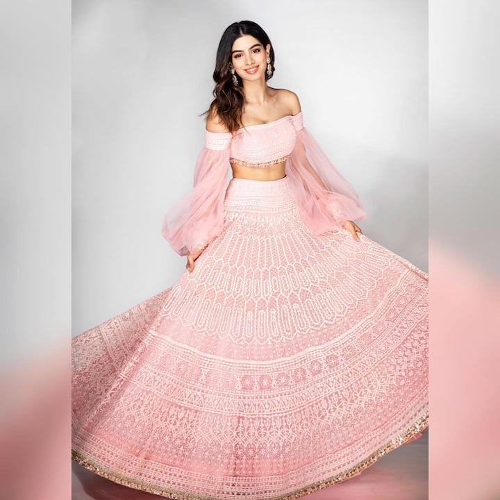 Janhvi’s little sister Khushi Kapoor also wore a soft pink lehenga designer by Manish Malhotra. The attire has beautiful intricate chikankari works all over the body and the off-shoulder balloon sleeves blouse serves as the icing on the cake. (Image courtesy - @manishmalhotraworls/Instagram)