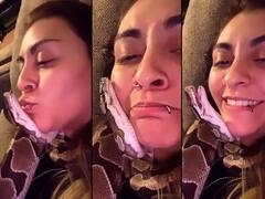 Viral Video : मुलीने अजगराचा किस घेतला अन्...पुढे काय घडलं ते पहाच