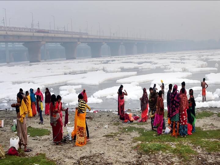 The Chhath Puja festival which is celebrated on the sixth day of Kartik month commences with Nahay Khay. In this photo, women devotees pray after taking bath as part of the rituals of Chhath Puja celebrations at Yamuna river at Kalindi Kunj in New Delhi, Monday, Nov. 8, 2021. (PTI Photo/Kamal Kishore)