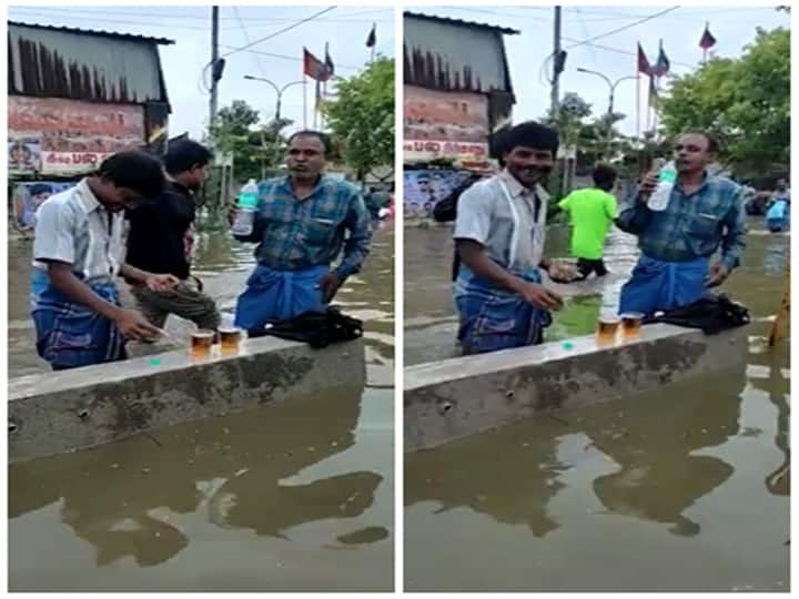 two people drinking comfortably in the rain water has gone viral on social media Watch Video: ‛மழையாவது வெள்ளமாவது... வா மாப்புள ஒரு கட்டிங் போடுவோம்’ சென்னையில் மழையில் ‛சியர்ஸ்’