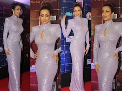 Malaika Arora Photos: ब्यूटी पेजेंट में सुंदरियों से हटकर मलाइका अरोड़ा पर टिक गई सबकी नजरें, कुछ ऐसी थी मलाइका की ड्रेस और अदाएं