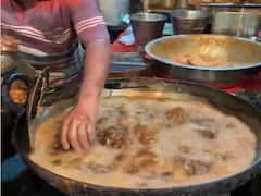 Street Vendor: ఇతడు మనిషా? రోబోటా? వేడి వేడి నూనెలో చికెన్ ముక్కలు వేసి...