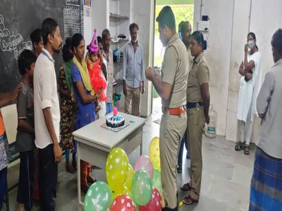Police celebrate Happy Birthday to a one year old child at a rain camp மழை முகாமில் ஒரு வயது குழந்தைக்கு ஹேப்பி பர்த்டே சர்ப்ரைஸ் கேக் வெட்டிய போலீசார்.!