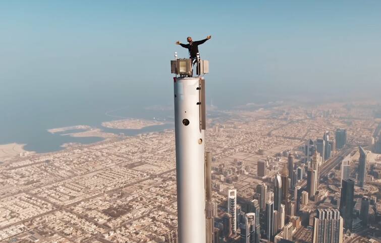 Hollywood actor Will Smith climbs to the top of Dubai's Burj Khalifa for fitness series Watch Video | புர்ஜ் கட்டடத்தின் உச்சிக்கு சரசரவென  ஏறிய வில் ஸ்மித்.! உச்சியில் அமர்ந்து மாஸான க்ளிக்!