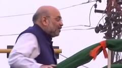 Varanasi पहुंचे Amit Shah, Madan Mohan Malaviya की प्रतिमा पर माल्यार्पण किया