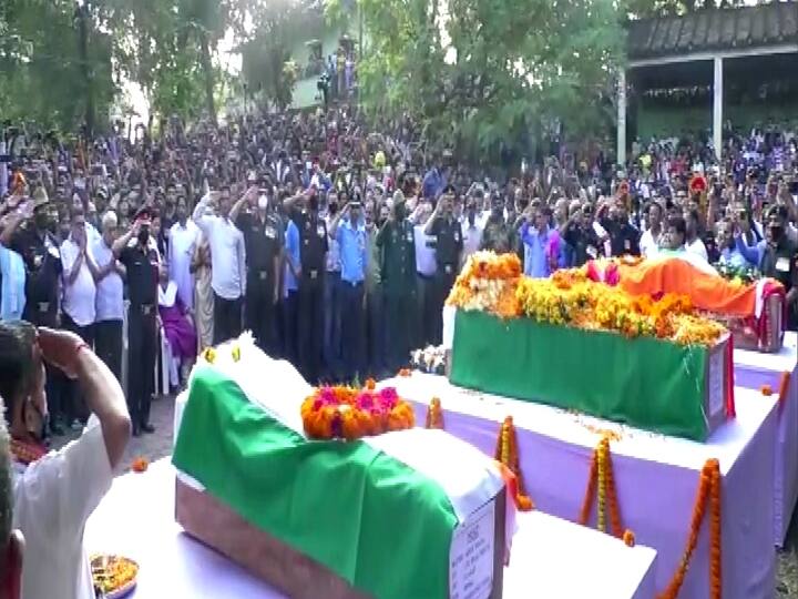 The mortal remains of Colonel Tripathi and his wife were consigned to flames while their son was buried at the crematorium. The colonel's younger brother, Anay Tripathi, who is also an Army officer and posted as Lieutenant Colonel in Shillong, lit the funeral pyre, PTI reported. (ANI Photo)