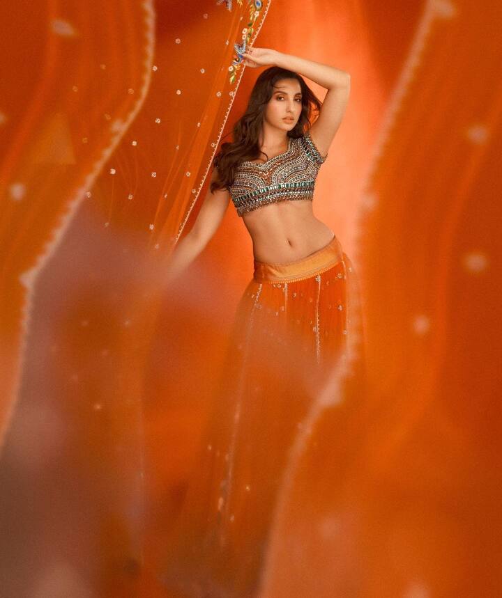 बॉलिवूडमधील प्रसिद्ध अभिनेत्री नोरा फतेही सोशल मीडियावर तिच्या वेगवेगळ्या लूकमधील फोटो नेहमी शेअर करत असते. (Photo:@norafatehi/IG)