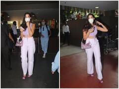 Nora Fatehi Photos: क्रॉप टॉप पहने नोरा फतेही के इस एयरपोर्ट लुक ने बढ़ाया इंटरनेट का तापमान, देखें तस्वीरें