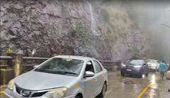 In Pics: తిరుమలలో వర్ష బీభత్సం... కాల్వలను తలిపిస్తున్న మాఢ వీధులు