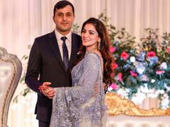 Newly Married Shraddha Arya Looks Resplendent In Saree As She Poses With Hubby At Her Wedding Reception