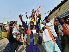 Farm Laws Withdrawn Photos: कृषि कानूनों को वापस लेने की घोषणा के बाद प्रदर्शनकारी किसानों ने कैसे मनाया जश्न, यहां तस्वीरें में देखिए
