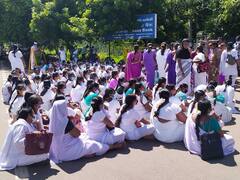 வீடு தேடி சென்று தடுப்பூசி செலுத்தும் திட்டம் - கைவிடக்கோரி கரூரில் செவிலியர்கள் போராட்டம்