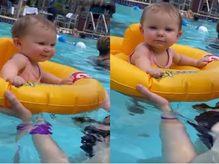 Viral Video of Cute Baby dancing in swimming pool netizens react in this way Viral Video: छोटी बच्ची का स्विमिंग पूल में डांस दिल जीत लेगा आपका, देखें बेहद प्यारा वीडियो