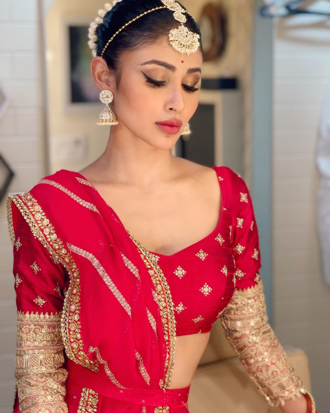 Mouni Roy Red Lehenga Look Creates a Stir at the 52nd IFFI Event in Goa