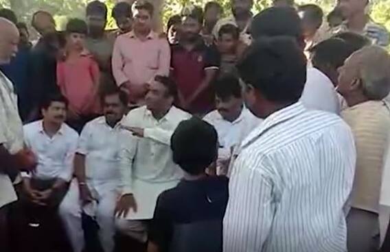 Ministers: సర్పంచ్ నైనా.. మీ కాళ్లు మెుక్కుతున్నా.. చెరువు తూములు తెరిపించండి