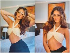 Tara Sutaria Photos: व्हाइट क्रॉप टॉप में Tara Sutaria का ये ग्लैमरस अंदाज़ देख उन्हीं पर थम जाएंगी आंखें, तस्वीरों में देखें खूबसूरत अंदाज़