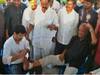 Tirupati: మానవత్వం చాటుకున్న ఎంపీ గురుమూర్తి... సీపీఐ నారాయణ కాలికి కట్టుకట్టిన వైసీపీ ఎంపీ
