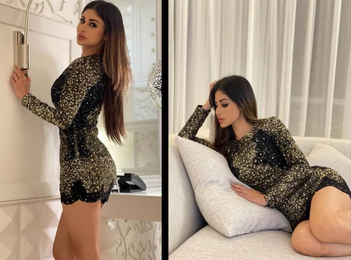 मौनी रॉय (Mouni Roy) इन दिनों दोहा में हैं जहां से वह एक से बढ़कर एक ग्लैमरस तस्वीरें सोशल मीडिया पर शेयर कर रही हैं. मौनी ने ब्लैक शिमरी ड्रेस में अपनी कुछ नई तस्वीरें सोशल मीडिया पर शेयर की हैं जिसमें उनका टोंड फिगर दिखाई दे रहा है.