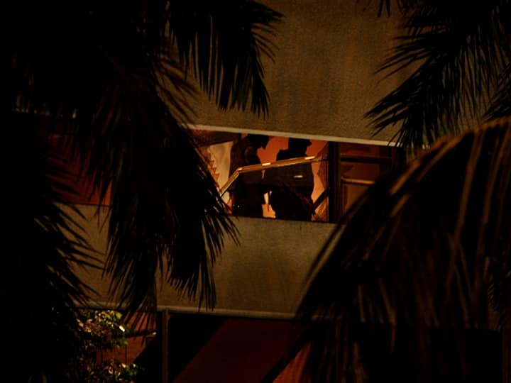 Eight of the attacks occurred in South Mumbai at Chhatrapati Shivaji Terminus, the Oberoi Trident, the Taj Palace & Tower, the Leopold Cafe, the Cama Hospital, the Nariman House, the Metro Cinema, and in a lane behind the St. Xavier's College. The photo dated November 27, 2008, captures firing at Oberoi Hotel. (File Photo: Getty Images)