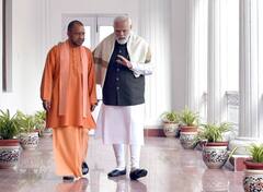 PM Modi and CM Yogi Viral Photo: पीएम मोदी ने सीएम योगी के कंधे पर हाथ रखकर क्या कहा था? राजनाथ सिंह ने बताई पूरी बात