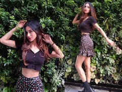 ब्लैक टॉप और मिनी स्कर्ट पहनकर Mouni Roy ने गार्डन में दिए खूबसूरत पोज़, तस्वीरों में देखिए स्टनिंग लुक