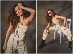 Tara Sutaria Photos: व्हाइट ड्रेस, काला चश्मा... गजब है तारा सुतारिया का स्वैग, एक्ट्रेस के इस ग्लैमरस अंदाज़ ने बढाया इंटरनेट का पारा