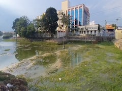 மேல்மருவத்தூர் ஆக்கிரமிப்பு நீர் நிலையை மீட்டெடுக்க எடுத்த நடவடிக்கை என்ன? - உயர்நீதிமன்றம் கேள்வி