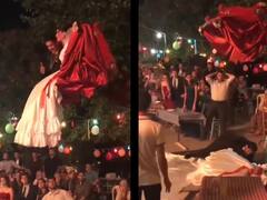 Viral Video: JCB पर बैठ दूल्हा-दुल्हन ने 'स्वैग' से मारी शादी में एंट्री, फिर जो हुआ वो देखकर छूट जाएगी आपकी हंसी