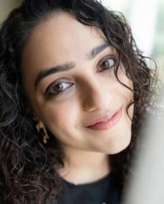 'மழைவரும் அறிகுறி என் விழிகளில் தெரியுதே’ : Gorgeous நித்யா மேனன் க்ளிக்ஸ்