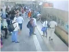 RPF Staff Rescues Woman: चलती ट्रेन में चढ़ने की कोशिश में फिसली महिला तो RPF जवान ने इस तरह बचाई जान, देखें Video