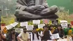 Winter Session: অধিবেশন শুরু আগে ফের উত্তপ্ত সংসদ চত্বর, সাসপেনশনের প্রতিবাদে গাঁধীমূর্তির পাদদেশে ধর্না | Bangla News