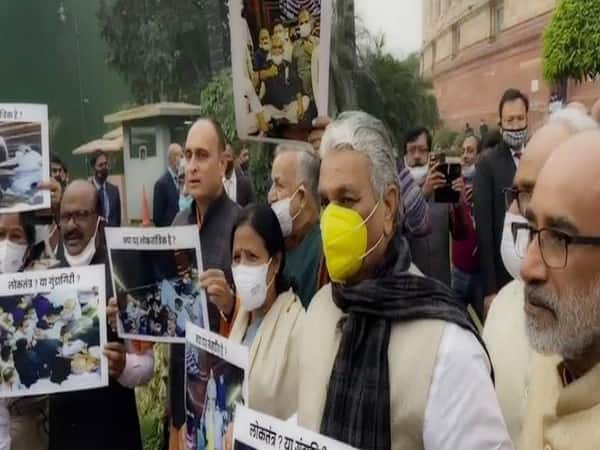 BJP MPs Protest Against Oppn ‘Unruly Behaviour’ Over Suspension Of 12 RS Members BJP MPs Protest Against Oppn's ‘Unruly Behaviour’ Over Suspension Of 12 RS Members