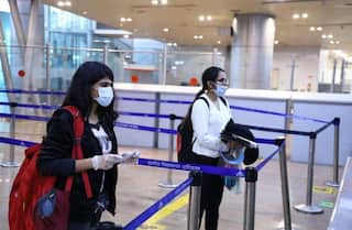 Omicron threat : A UK passenger found covid positive at Ahmedabad airport Omicron threat : UKથી અમદાવાદ એરપોર્ટ પર આવેલો મુસાફરો સંક્રમિત મળતાં તંત્ર થયું દોડતું, જાણો શું લીધા પગલા?