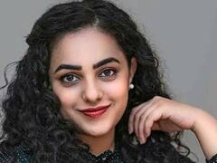 actress nithya menon clicks : கருப்பு உடையில் மனம் கவர்ந்த நித்யா மேனன்... இன்ஸ்டா க்ளிக்ஸ்...