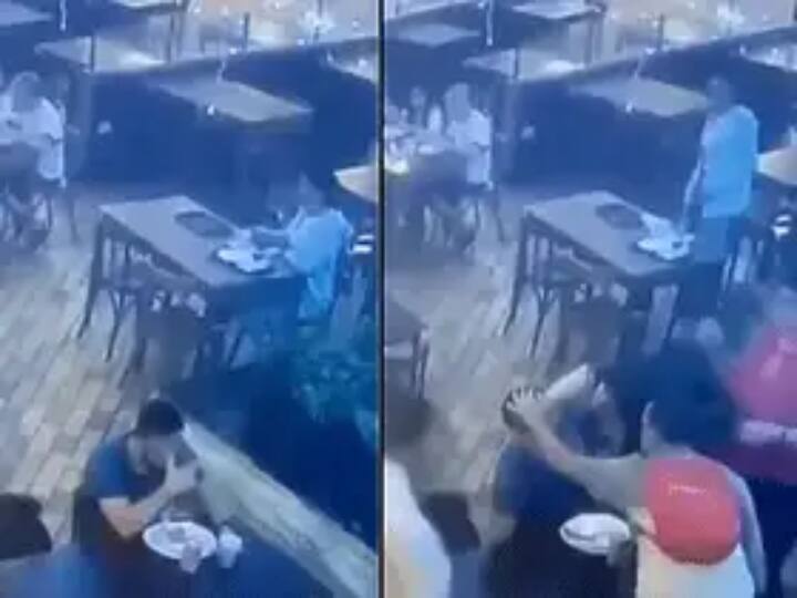 police and waiter saves man chock in brazil  restaurant viral video Watch Video : சாப்பிடும்போது மூச்சுத்திணறல்.. மயக்கம்.. முதலுதவி செய்து காப்பாற்றிய வெயிட்டரும், போலீஸும்..