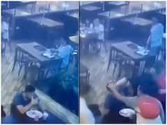 Viral Video: गले में खाना फंसने से बेहोश हुआ शख्स, वेटर और पुलिसवाले ने ऐसे बचाई जान, वीडियो होने लगा वायरल