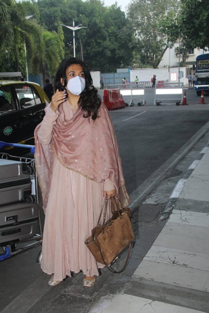 Kabir's wife Mini Mathur looked lovely in her pastel suit as she was snapped at the airport.[pic credit: Manav Manglani]