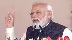 PM Modi ATTACKS Akhilesh Yadav via gestures in Gorakhpur: 'Lal Topi Waale UP ke liye RED ALERT'