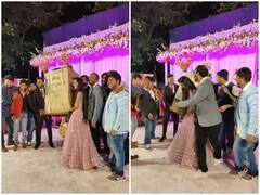 Viral Video: दोस्तों ने रिसेप्शन पर दूल्हे-दुल्हन को दिया बड़ा गिफ्ट, बॉक्स खुलने के बाद जो निकला उसे देख सब हो गए हैरान, वीडियो वायरल