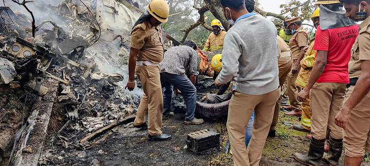 The mangled and burnt remains of the ill-fated IAF chopper were strewn along the site, even as rescue services personnel were seen carrying bodies in stretchers to be transported through waiting ambulances. (Image: PTI)