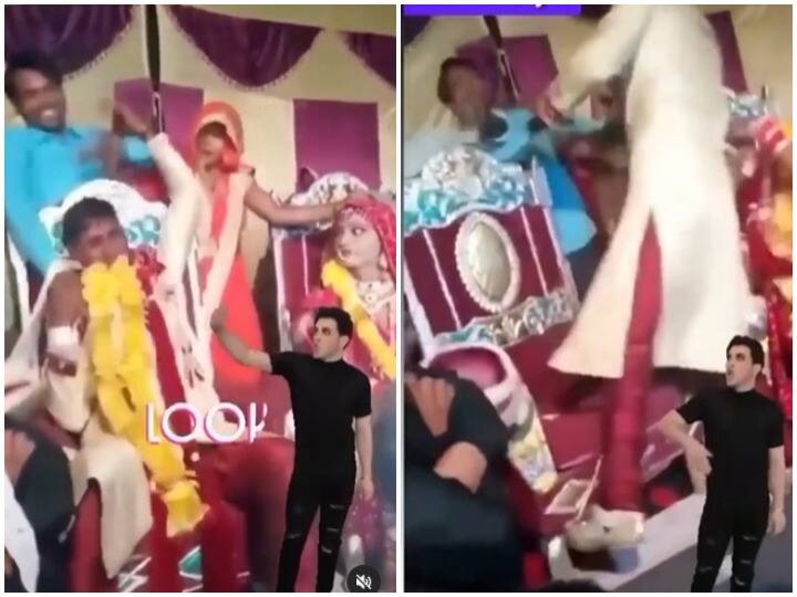 Watch: फोटो खिंचाते वक्त दोस्त खींच रहा था गाल, दूल्हे को आया गुस्सा और थप्पड़ मारकर कर दिया उसी को लाल Viral Video Fun with groom on stage, groom got angry and started beating his friend Watch: फोटो खिंचाते वक्त दोस्त खींच रहा था गाल, दूल्हे को आया गुस्सा और थप्पड़ मारकर कर दिया उसी को लाल