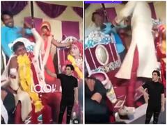 Watch: फोटो खिंचाते वक्त दोस्त खींच रहा था गाल, दूल्हे को आया गुस्सा और थप्पड़ मारकर कर दिया उसी को लाल