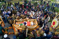 CDS Gen Bipin Rawat Final Journey:চোখের জলে সস্ত্রীক জেনারেল রাওয়াতকে চিরবিদায়, শেষযাত্রায় রাস্তার দু’ধার থেকে পুষ্পবৃষ্টি