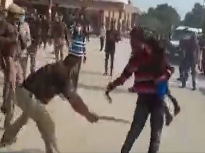 UP Police Thrashes Man Holding Child In Arm, Suspended After Video Goes Viral. Priyanka Slams Yogi Govt UP Cop Thrashes Man Holding Child In Arm, Suspended After Video Goes Viral. Priyanka Slams Yogi Govt