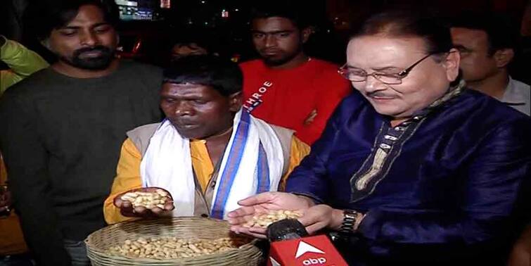 Madan Mitra meets viral peanut seller while campaigning for TMC in KMC election in Charu Market Area KMC Election 2021: বুথে বসে বাদাম খেতে খেতে স্ক্রিপ্ট লিখবে আমাদের ছেলেরা, ভাইরাল ভুবনকে পাশে নিয়ে বার্তা মদনের