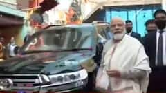 Kashi Vishwanath Corridor: PM Modi waves at people during his grand welcome
