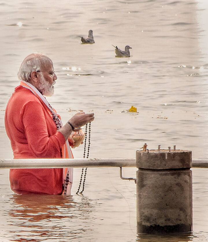 Prime Minister took a holy dip in the river Ganga, in Varanasi. Prime Minister Narendra Modi inaugurated the Kashi Vishwanath Corridor on Monday at his parliamentary constituency. (PTI Photo)