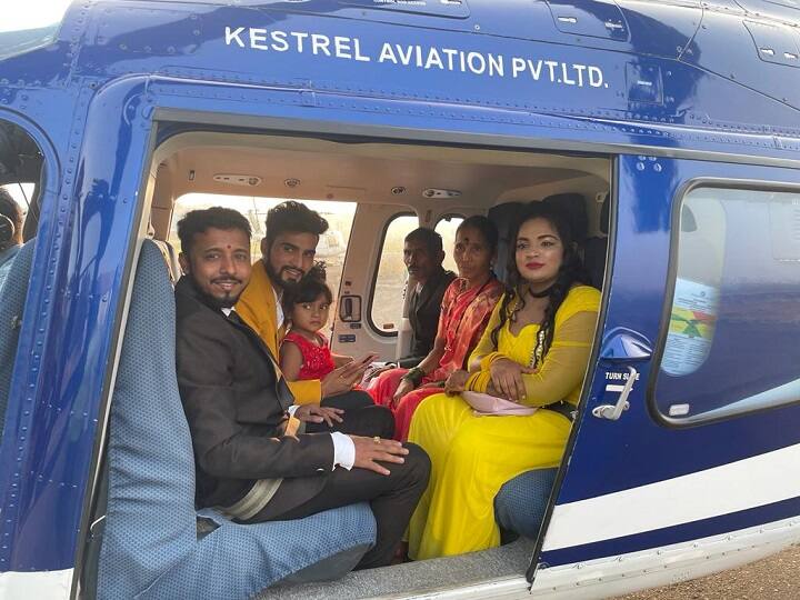 Navi Mumbai Helicopter Ride for parents अवघ्या जीवनाचं सोनं झालं! गवंडी कामगाराच्या मुलानं आई-वडिलांची केली हेलिकॉप्टर सफारी